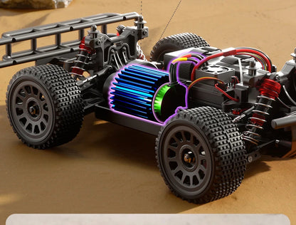 Close-up of a model car chassis with electronic components on a brown surface