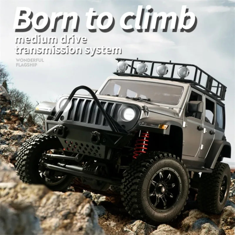 Model off-road vehicle climbing a rocky terrain with 'Born to Climb' text above.