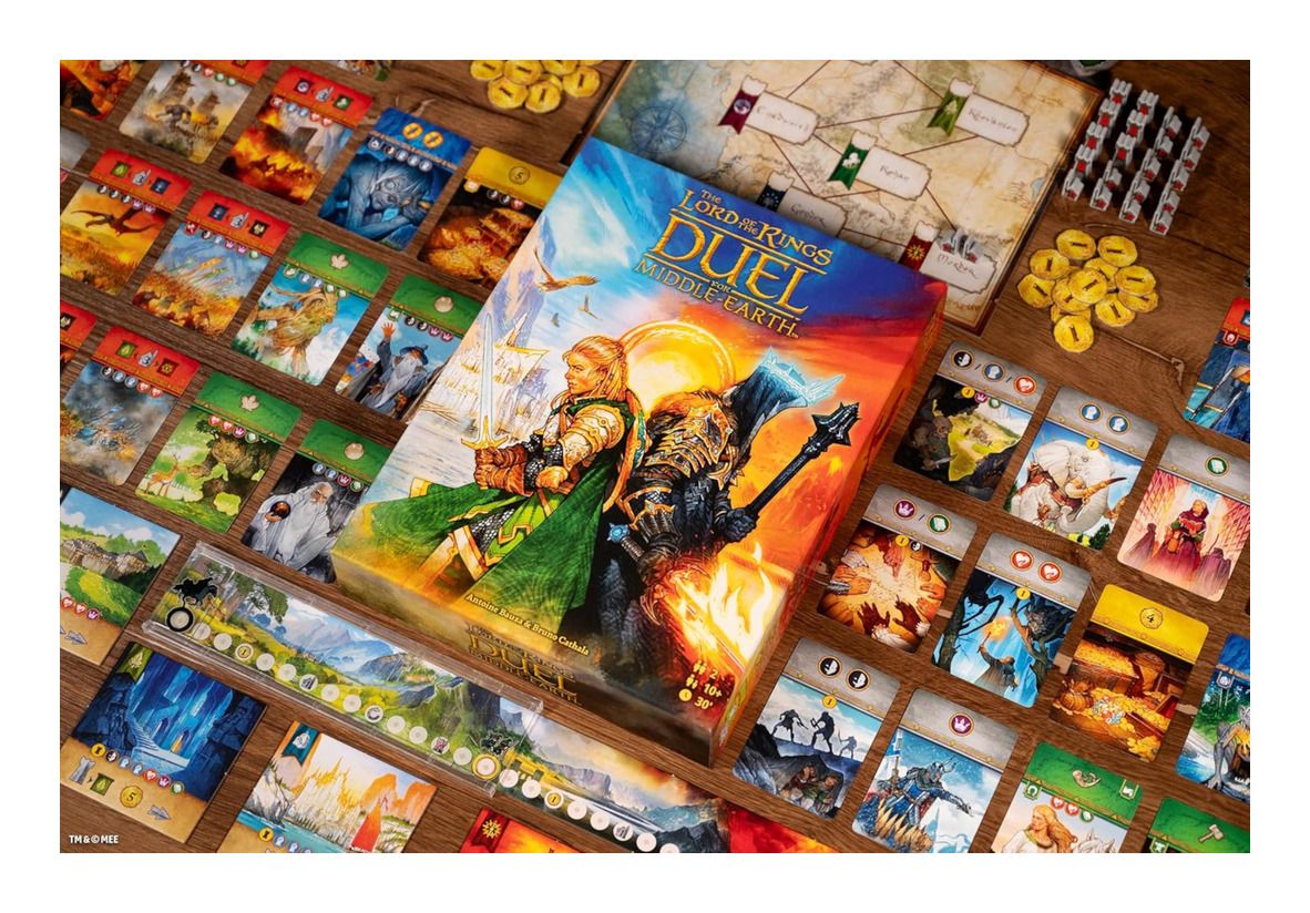 Board game packaging for 'The Lord of the Rings: Duel on Middle-earth' with game pieces and cards on a wooden surface.