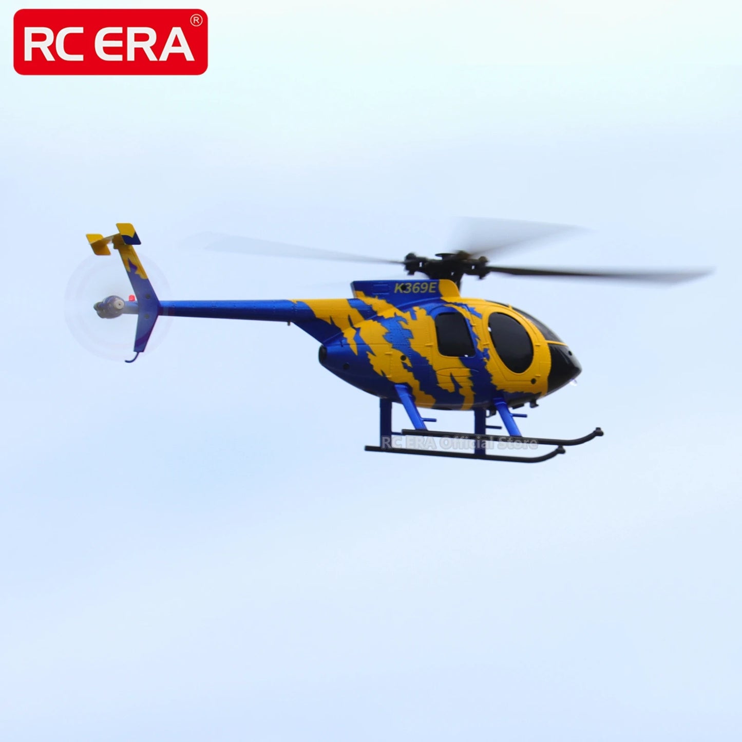 Colorful RC helicopter with 'RC ERA' branding against a clear blue sky.