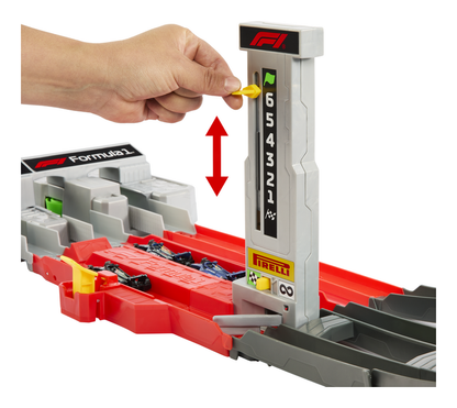 Hot Wheels Racing Grand Prix Racing Circuit Track Set  Tool organizer with a hand placing a tool into it, featuring Pirelli branding.