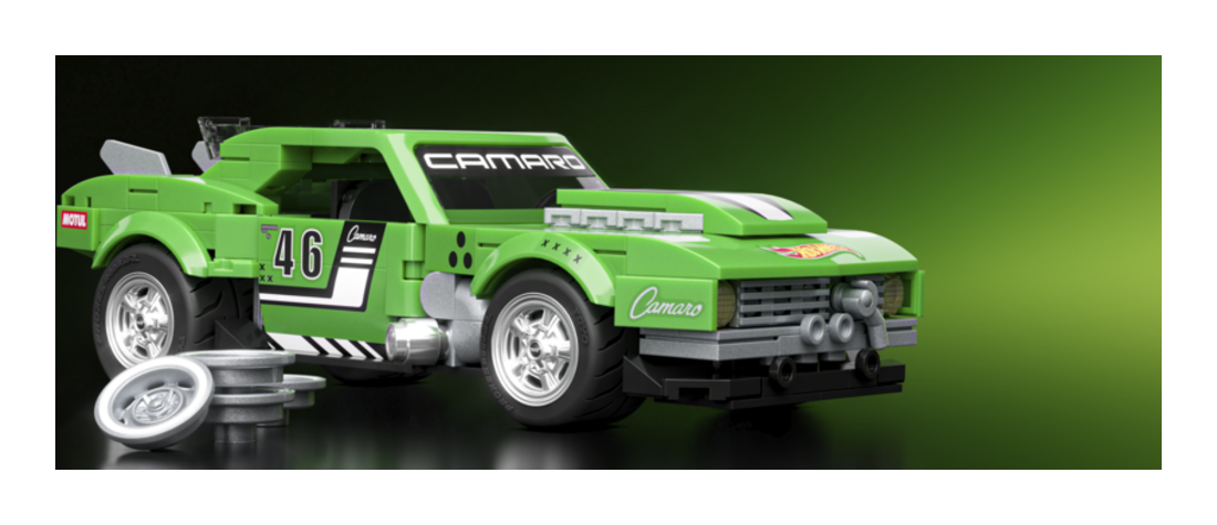 1:32 Scale Hot Wheels Speed Custom 68 Camero Exclusive Custom Decals Green toy car with 'Camaro' branding on a green background