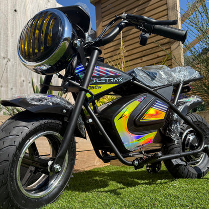 Littletrax 350W Kids Electric Bike Black electric bike with colorful design on grass