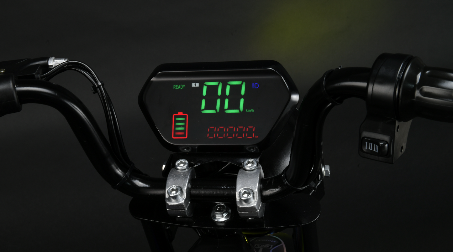 Digital display on a motorcycle handlebar with green and red text against a dark background