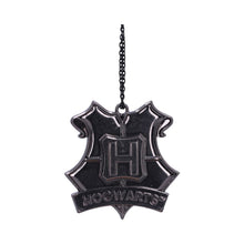 Black Hogwarts pendant with chain on a white background