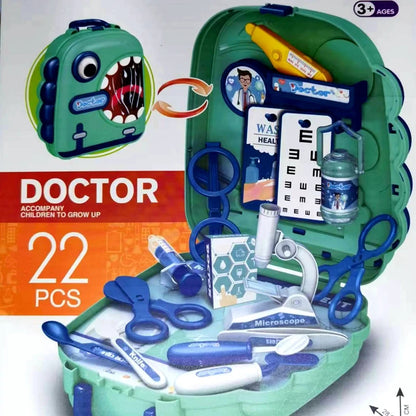 Toy doctor set with various medical tools in a green case on a white background