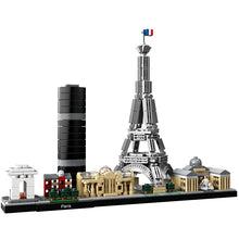 A completed model of the Paris skyline made from building blocks, featuring iconic landmarks such as the Eiffel Tower, Arc de Triomphe, and Notre-Dame Cathedral.