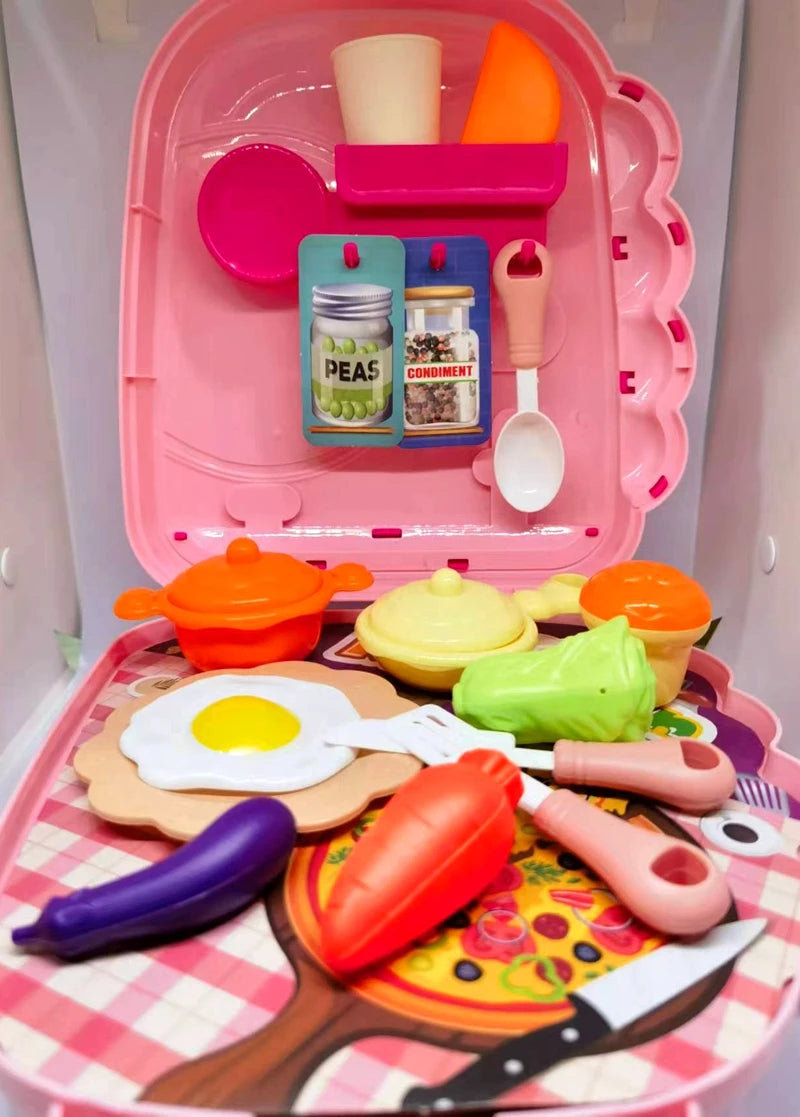 Toy kitchen set with various food items and utensils on a checkered tablecloth.