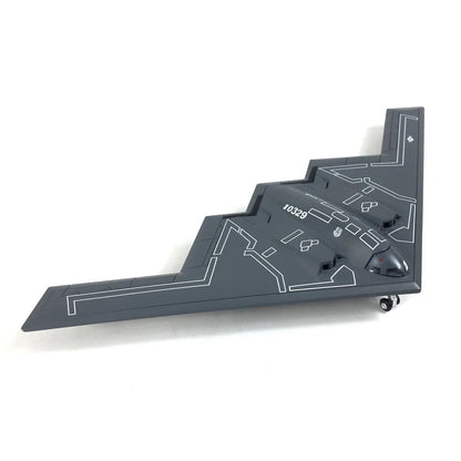 Gray model of a stealth aircraft on a white background