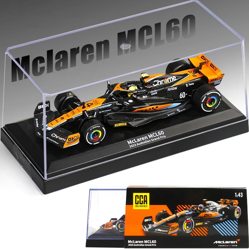 Model McLaren MCL60 racing car in a clear display case with packaging below.