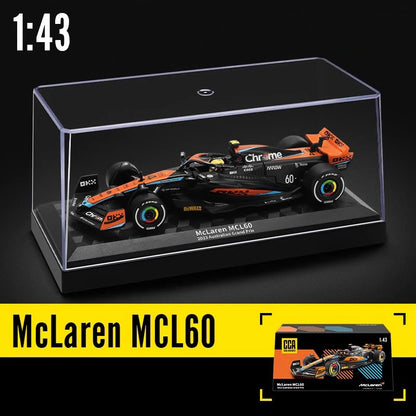 McLaren MCL60 model car in a clear display case with 'Chrome' branding.