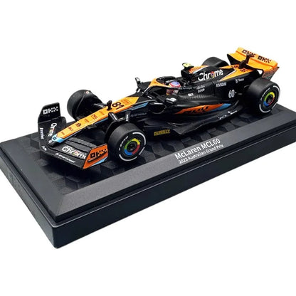 Model of a McLaren Formula 1 car on a black display stand with 'Chrome' branding.