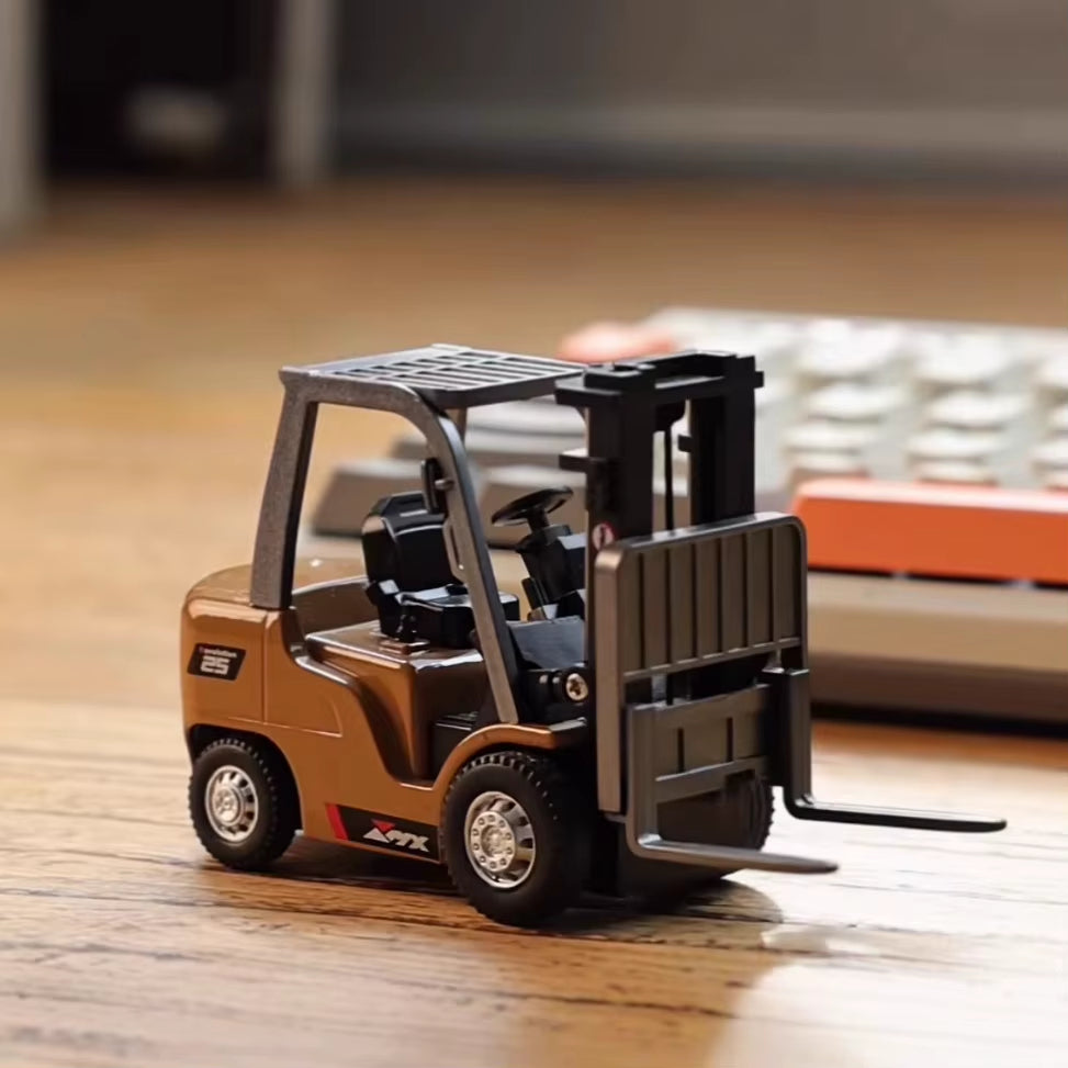 NEXUS RC 1/64 Scale Mini RC Forklift Truck 2.4GHz Controller Small model of a forklift on a wooden floor