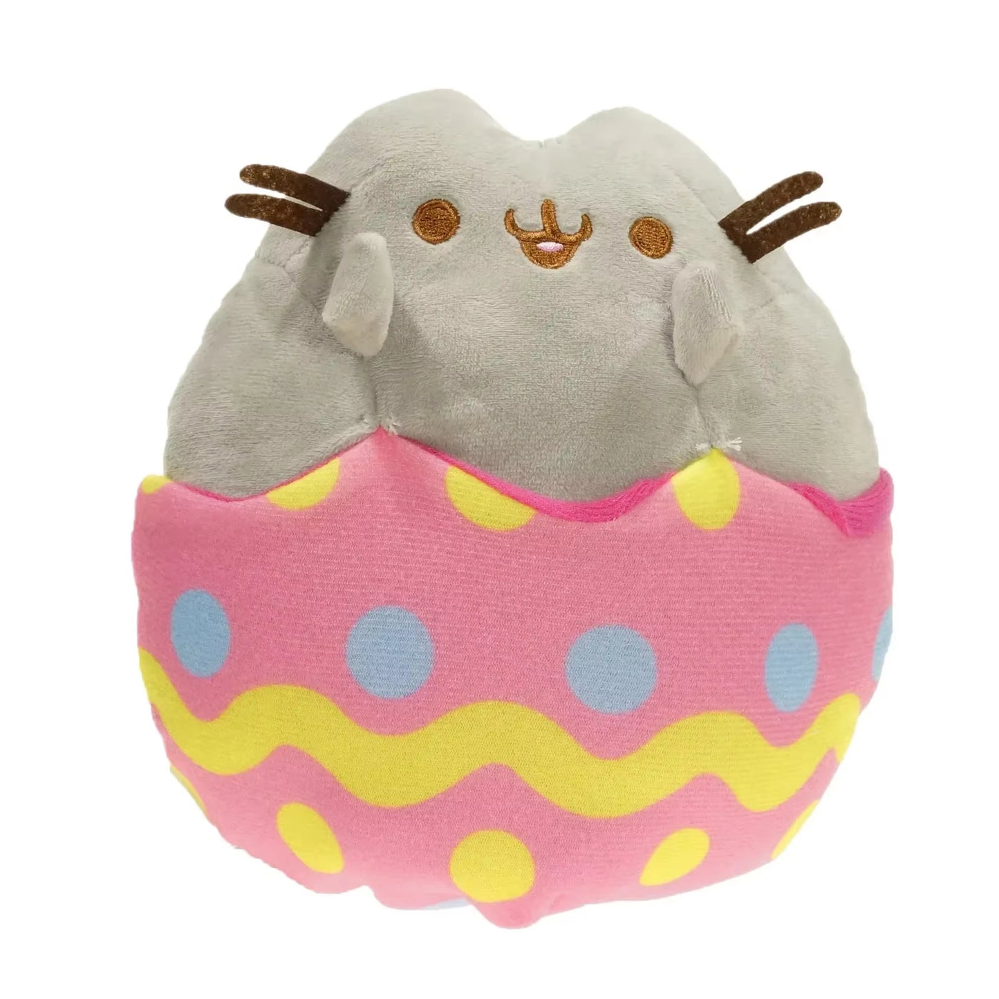 Plush toy resembling a cat in an Easter egg with pink and yellow pattern on a white background