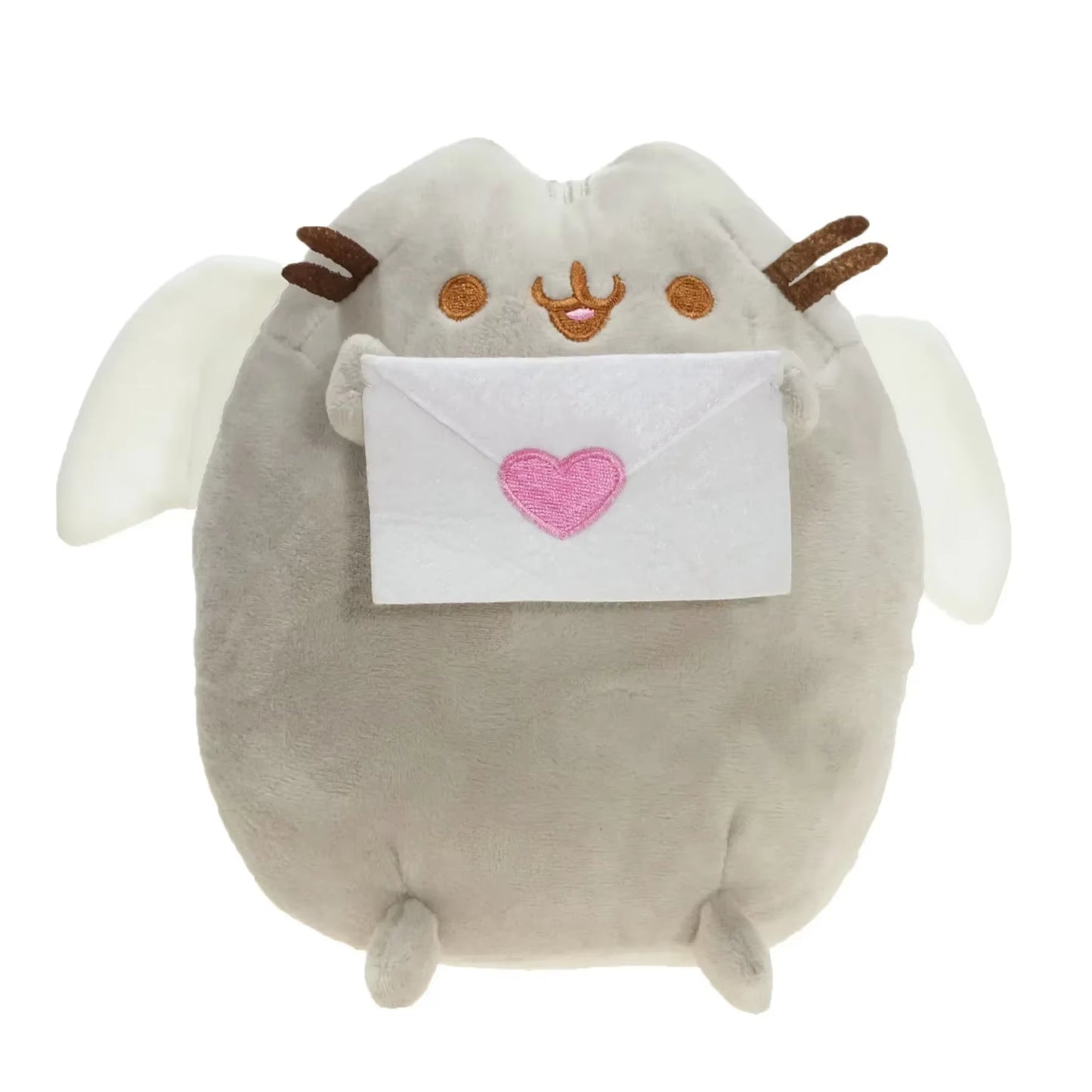 Plush toy with a heart and letter on a white background