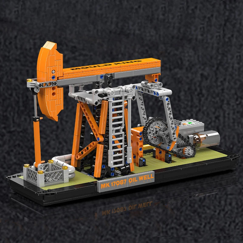 Model of an oil pumpjack made from interlocking bricks on a dark background