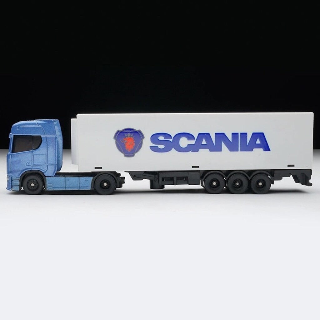 Model truck with Scania branding on a white background