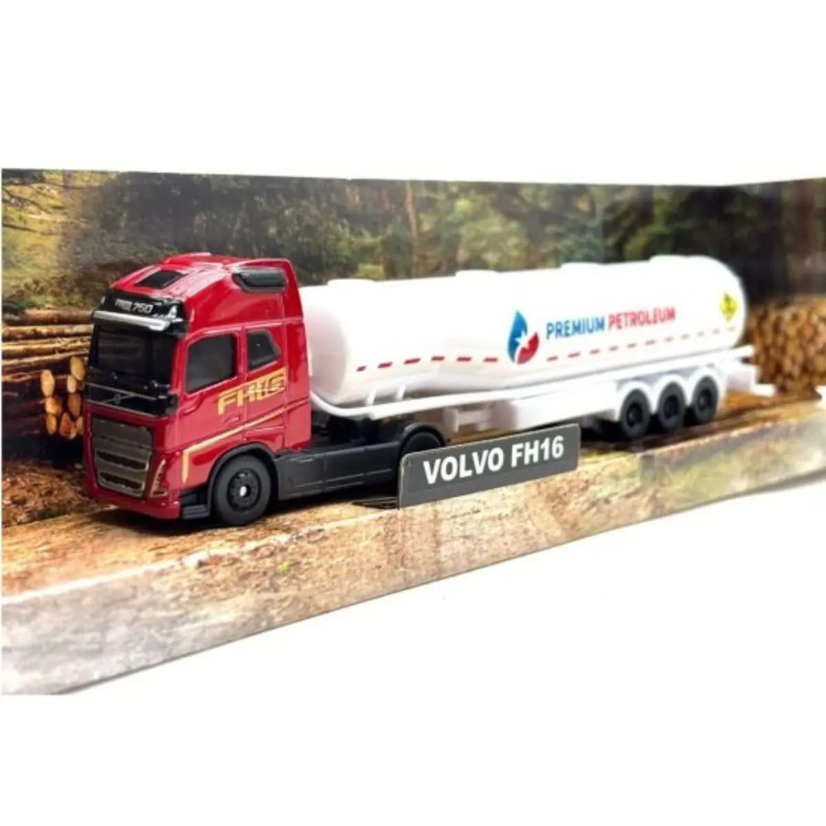 Model of a red and white Volvo FH16 tanker truck on a wooden surface with a scenic background.
