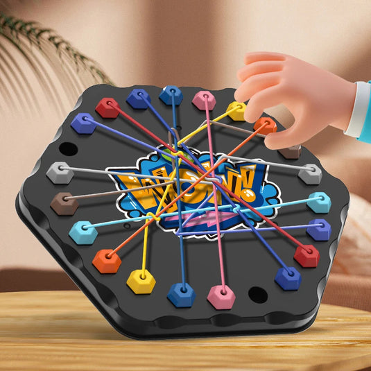 Colorful puzzle game with a hand interacting with it on a wooden surface.
