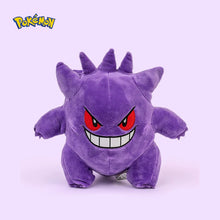 Gengar plush toy with red eyes and a grinning expression on a white background, featuring the Pokémon logo.