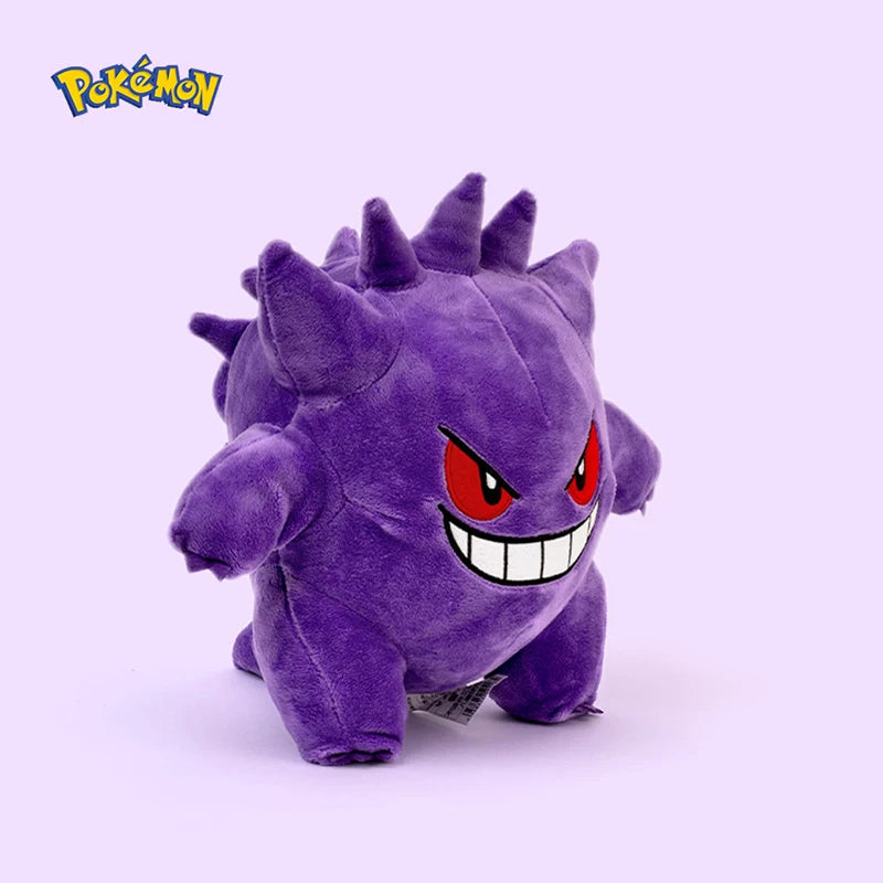 Purple plush toy with red eyes and sharp teeth on a white background, featuring the Pokémon logo.