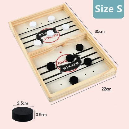 Wooden table hockey game with dimensions on a pink background