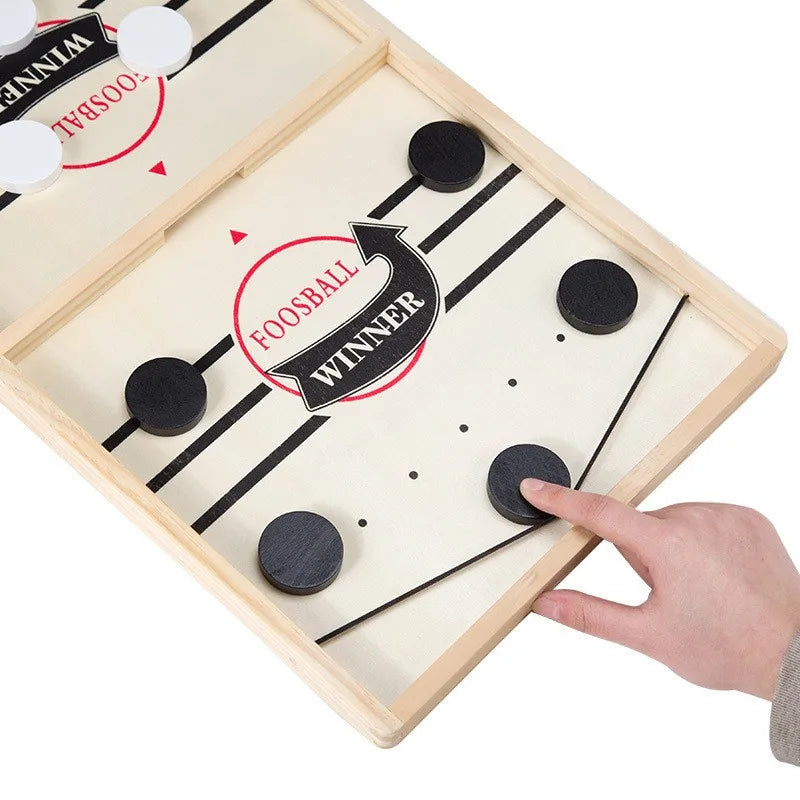 Foosball game board with hand interacting, on a white background