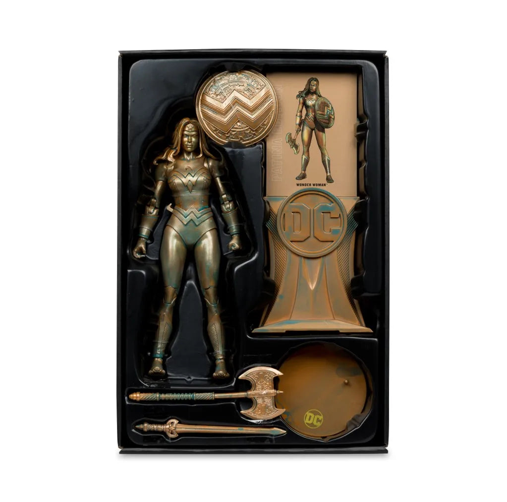 Bronze action figure of Wonder Woman with accessories in a black box with DC logo