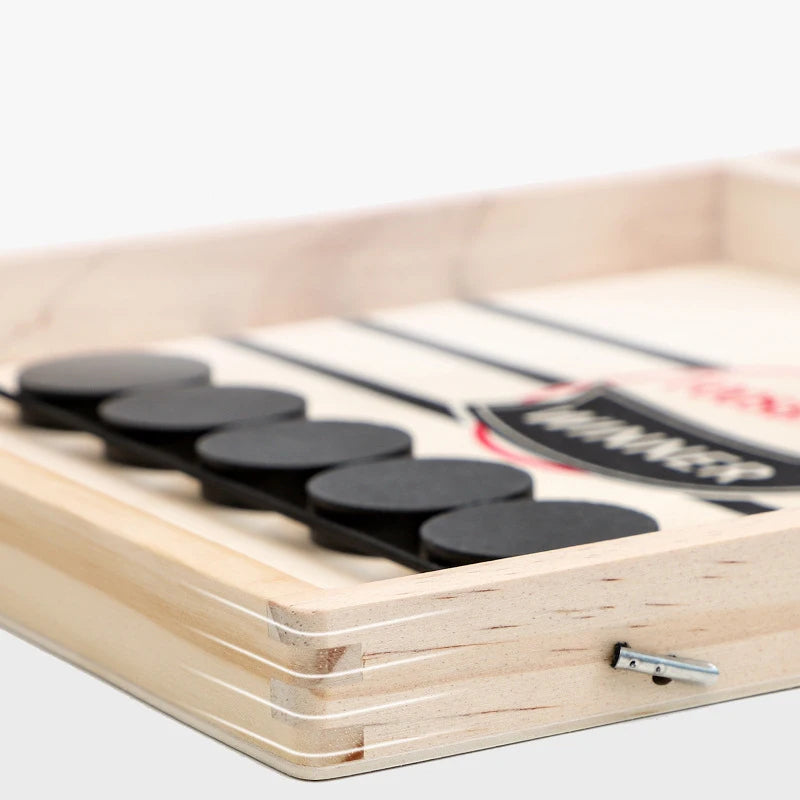 Wooden cricket bat with black handles and a visible brand logo on a white background