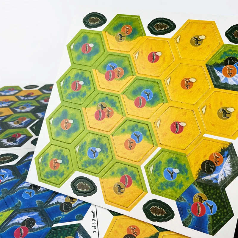 Hexagonal game tiles with various symbols on a white background