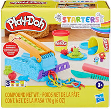 Play-Doh toy set packaging with tools and play-doh containers on a yellow background