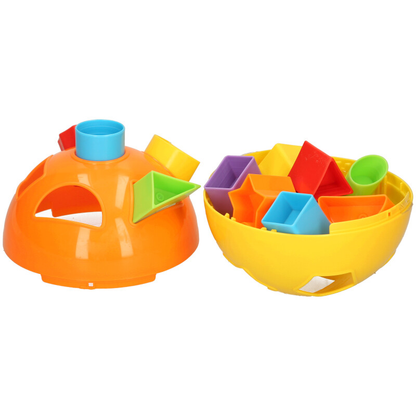 Colorful plastic toy set with shapes on a white background