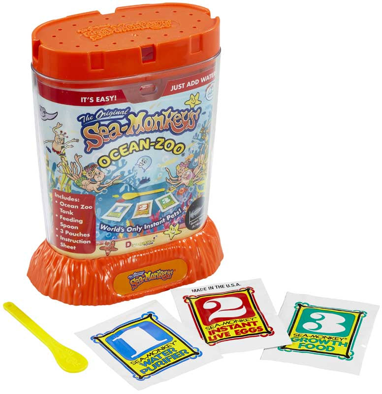 Sea-Monkey Ocean-Zoo kit with colorful packaging and sea-monkey cards on a white background